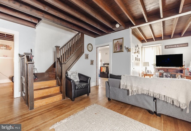 28 Chestnut St, Salem, NJ 08079 - living area with wood ceiling with exposed beams, stairs, and wood finished floors