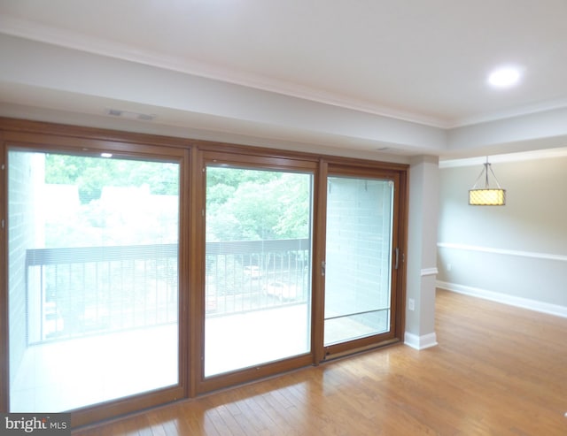 2216 Springwood Dr Unit 202, Reston, VA 20191 - spare room featuring ornamental molding, light wood-style floors, baseboards, and recessed lighting
