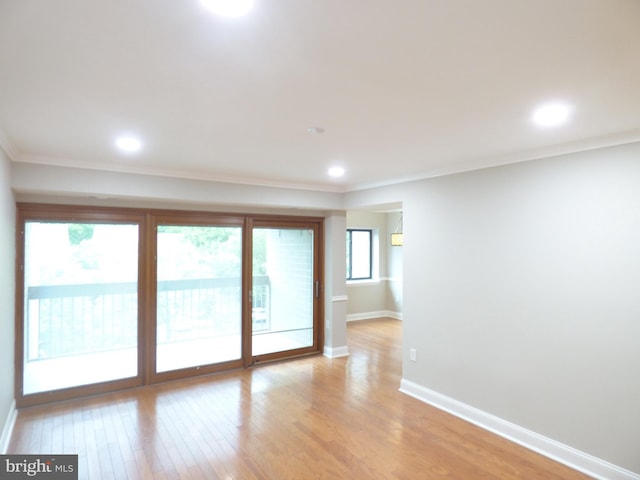 2216 Springwood Dr Unit 202, Reston, VA 20191 - unfurnished room with ornamental molding, light wood-type flooring, baseboards, and recessed lighting