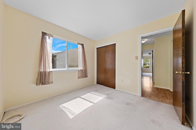 127 Mohican Ln, Little Egg Harbor Twp, NJ 08087 - unfurnished bedroom featuring carpet floors, a closet, and baseboards