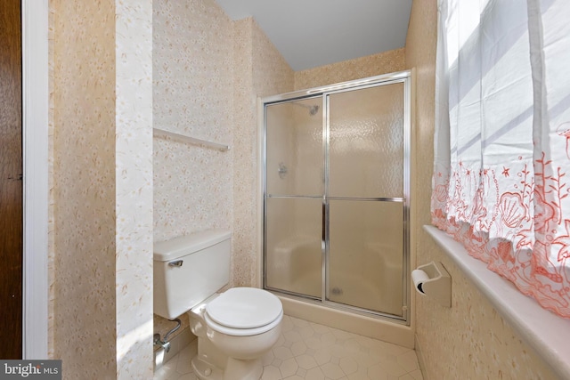 127 Mohican Ln, Little Egg Harbor Twp, NJ 08087 - bathroom featuring a shower stall, toilet, and tile patterned flooring