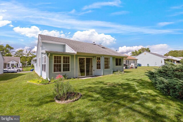 127 Mohican Ln, Little Egg Harbor Twp, NJ 08087 - back of property with a yard and a shingled roof