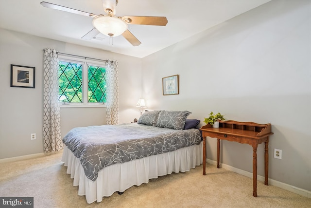 4499 Larchmont Ct, Dumfries, VA 22025 - bedroom featuring light carpet, baseboards, and ceiling fan