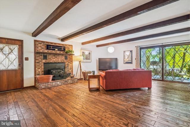 4499 Larchmont Ct, Dumfries, VA 22025 - living area with hardwood / wood-style flooring, beam ceiling, and a wood stove