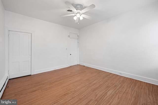812 Powers St, Baltimore, MD 21211 - spare room featuring light wood-type flooring, a ceiling fan, and baseboards