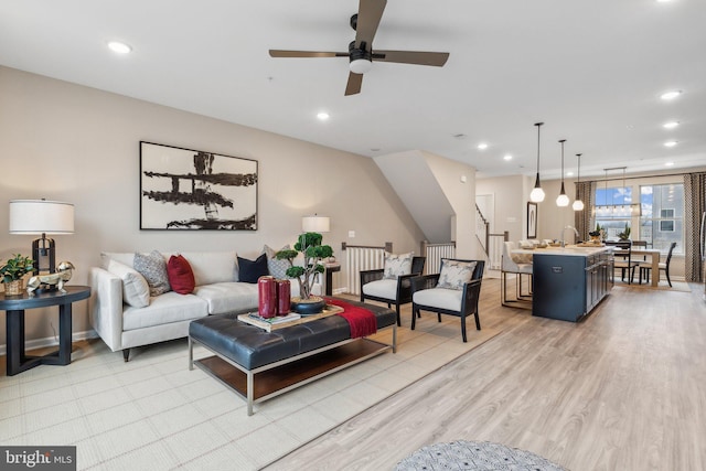 16519 Saint Marion Way, Bowie, MD 20716 - living area featuring a ceiling fan, light wood-type flooring, recessed lighting, and stairway