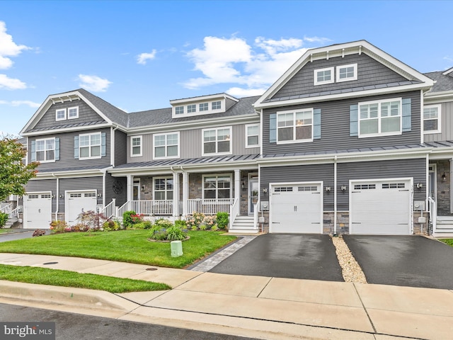 306 Prospect St, Milton, DE 19968 - view of property with a standing seam roof, driveway, a porch, and a front yard