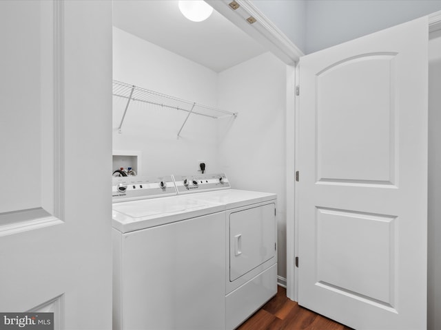 306 Prospect St, Milton, DE 19968 - washroom featuring washing machine and clothes dryer and dark wood-style floors
