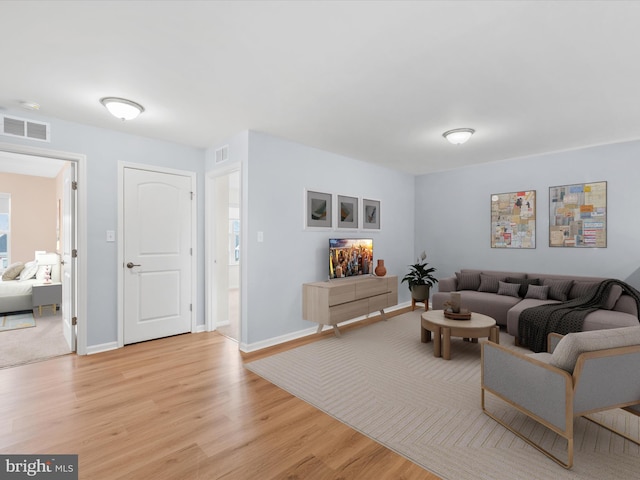 306 Prospect St, Milton, DE 19968 - living room featuring light wood-style floors and baseboards
