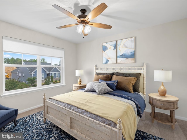 306 Prospect St, Milton, DE 19968 - bedroom with carpet, baseboards, and ceiling fan