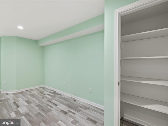306 Prospect St, Milton, DE 19968 - basement with recessed lighting, wood finished floors, and baseboards