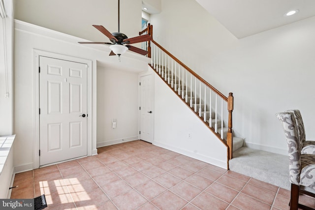 18442 Lanier Island Sq, Leesburg, VA 20176 - foyer with stairway, ceiling fan, light tile patterned floors, recessed lighting, and baseboards