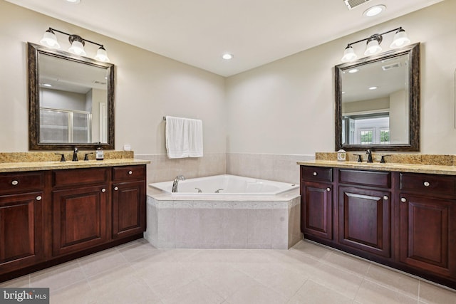 18442 Lanier Island Sq, Leesburg, VA 20176 - full bathroom with two vanities, a jetted tub, tile patterned flooring, a shower stall, and recessed lighting