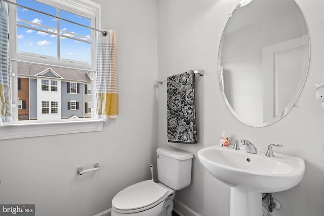 8486 Craggan Ln, Manassas, VA 20109 - bathroom with baseboards, toilet, and a sink