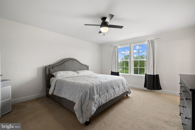 8486 Craggan Ln, Manassas, VA 20109 - bedroom with baseboards, light colored carpet, and a ceiling fan