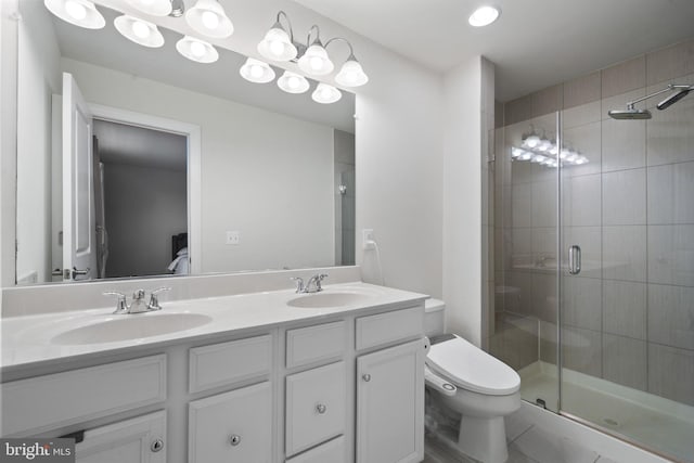 8486 Craggan Ln, Manassas, VA 20109 - full bath featuring double vanity, a stall shower, and toilet