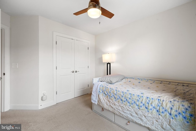 8486 Craggan Ln, Manassas, VA 20109 - bedroom with carpet floors, a closet, baseboards, and ceiling fan