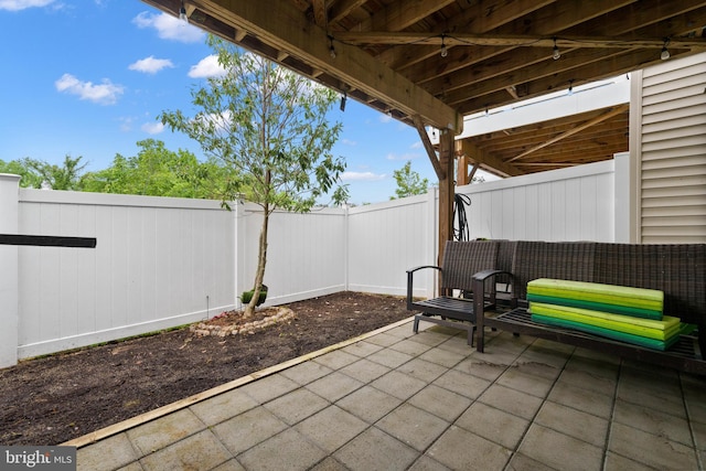 8486 Craggan Ln, Manassas, VA 20109 - fenced backyard featuring a patio area
