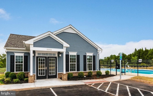 8486 Craggan Ln, Manassas, VA 20109 - view of building exterior with uncovered parking