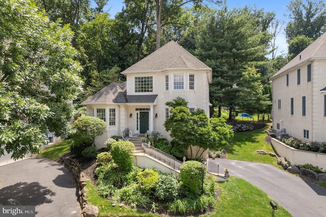 411 Merion Hill Ln, Conshohocken, PA 19428 - french country style house with roof with shingles and a front lawn