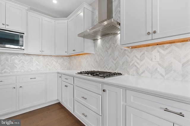 411 Merion Hill Ln, Conshohocken, PA 19428 - kitchen featuring wall chimney exhaust hood, stainless steel appliances, light countertops, and white cabinets