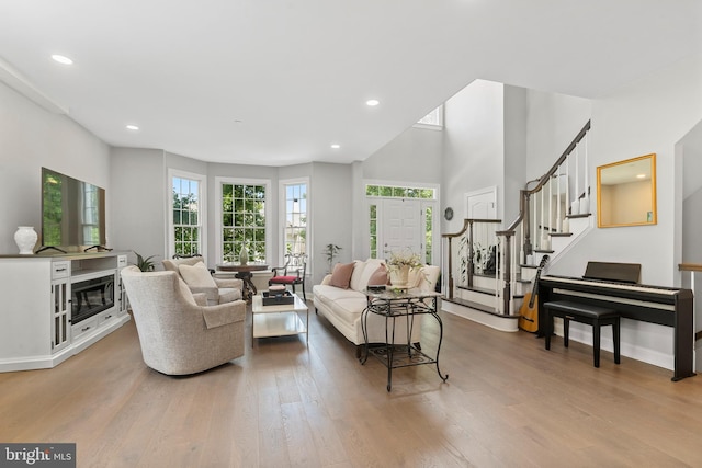 411 Merion Hill Ln, Conshohocken, PA 19428 - living area featuring wood finished floors, stairs, and recessed lighting