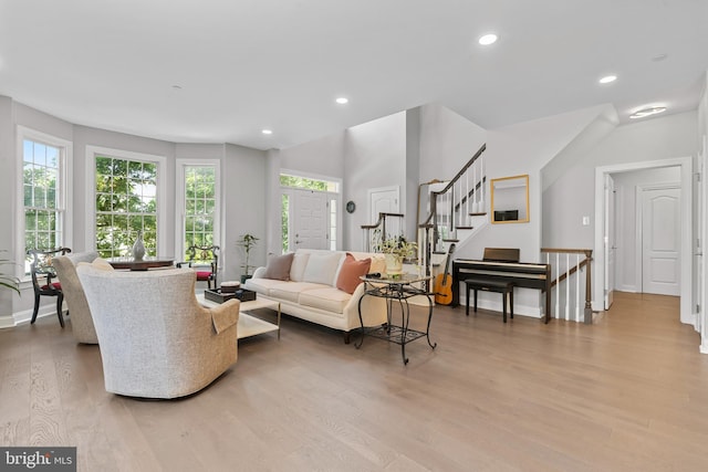 411 Merion Hill Ln, Conshohocken, PA 19428 - living area featuring light wood finished floors, stairs, and recessed lighting