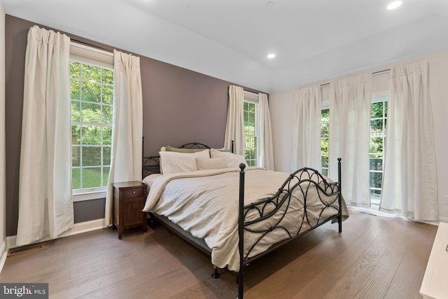 411 Merion Hill Ln, Conshohocken, PA 19428 - bedroom featuring wood-type flooring, multiple windows, and recessed lighting