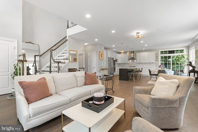 411 Merion Hill Ln, Conshohocken, PA 19428 - living room with recessed lighting, stairway, and wood finished floors