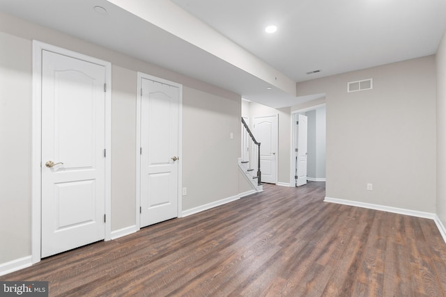 411 Merion Hill Ln, Conshohocken, PA 19428 - basement featuring dark wood-type flooring, stairway, and recessed lighting