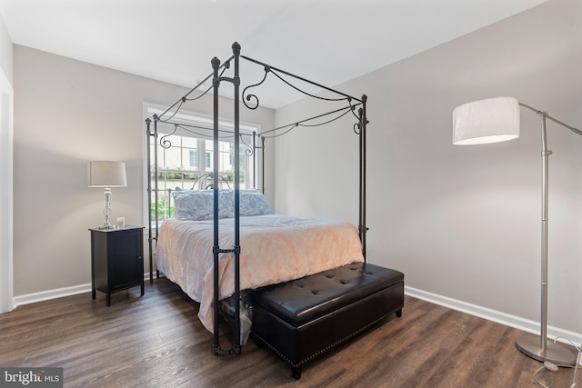 411 Merion Hill Ln, Conshohocken, PA 19428 - bedroom with baseboards and dark wood-style flooring