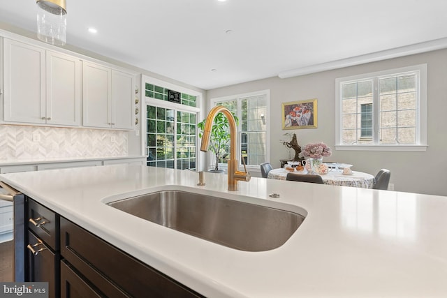 411 Merion Hill Ln, Conshohocken, PA 19428 - kitchen with light countertops, white cabinets, recessed lighting, and dark brown cabinets