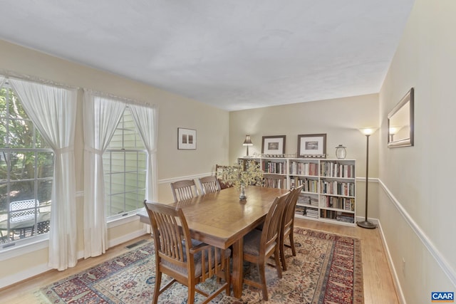 2 Whippoorwill Ln, Palmyra, VA 22963 - dining area with wood finished floors, plenty of natural light, and baseboards
