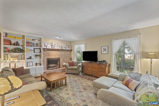 2 Whippoorwill Ln, Palmyra, VA 22963 - living area featuring a fireplace and wood finished floors