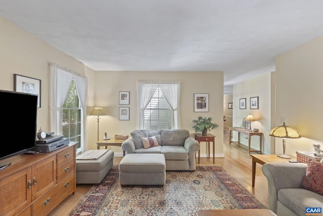 2 Whippoorwill Ln, Palmyra, VA 22963 - living room with light wood-style floors and plenty of natural light