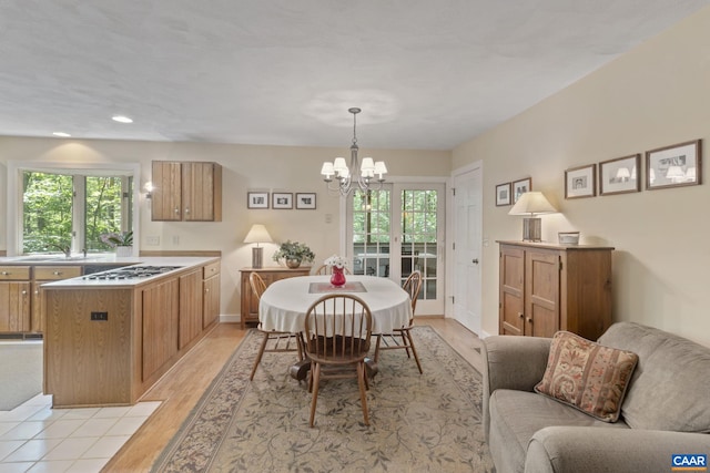2 Whippoorwill Ln, Palmyra, VA 22963 - dining room featuring a chandelier, healthy amount of natural light, light wood-style flooring, recessed lighting, and baseboards