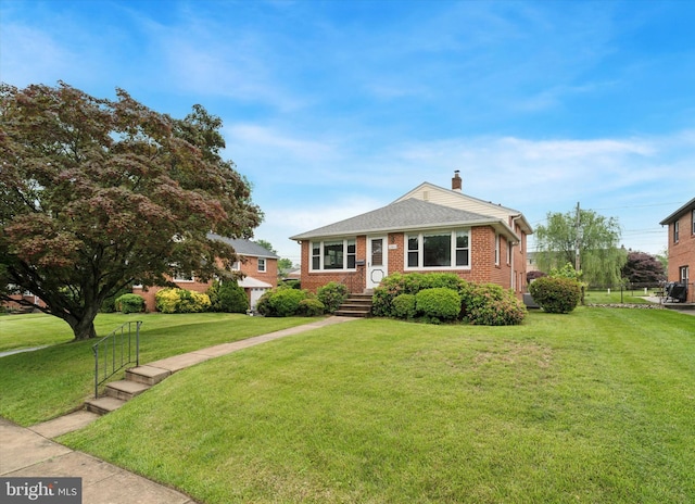 2904 Armstrong Ave, Secane, PA 19018 - view of front of house featuring a chimney, a front lawn, and brick siding