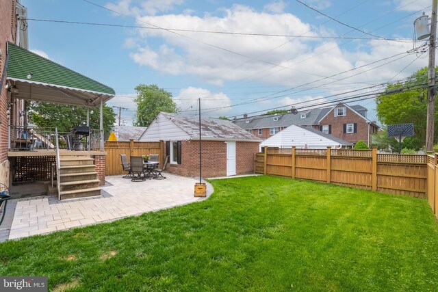 409 Regester Ave, Baltimore, MD 21212 - view of yard with a patio, an outdoor structure, and a wooden deck