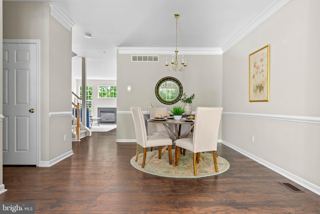 119 Fringetree Dr, West Chester, PA 19380 - dining space with stairs, a chandelier, baseboards, wood finished floors, and crown molding