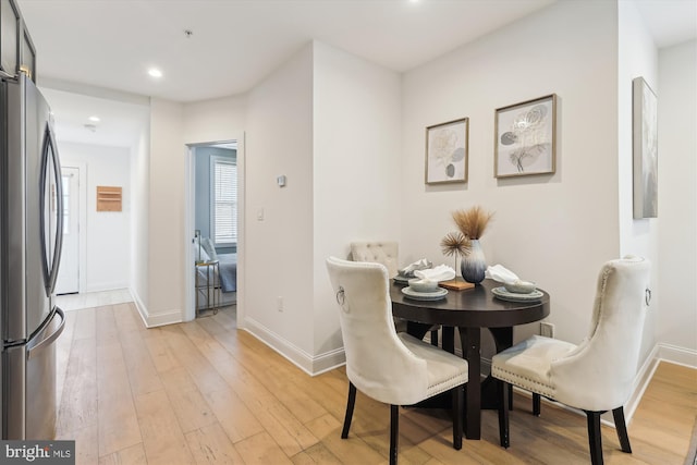200 Hamilton St NW Unit 2, Washington, DC 20011 - dining area with baseboards, light wood finished floors, and recessed lighting