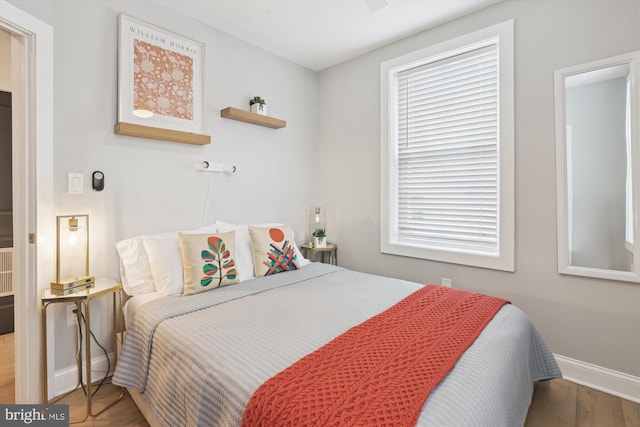 200 Hamilton St NW Unit 2, Washington, DC 20011 - bedroom with baseboards and wood finished floors