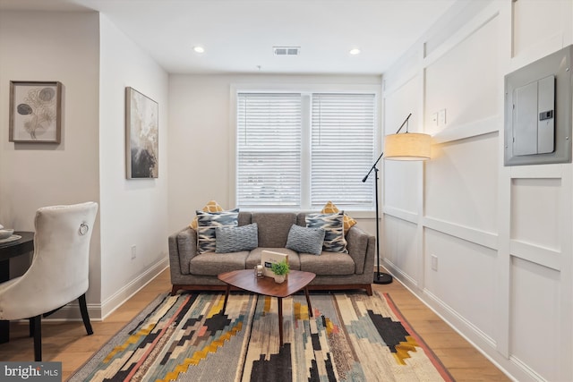 200 Hamilton St NW Unit 2, Washington, DC 20011 - living room with light wood finished floors, electric panel, baseboards, and recessed lighting