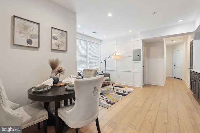 200 Hamilton St NW Unit 2, Washington, DC 20011 - dining room featuring light wood-style floors, electric panel, recessed lighting, and baseboards