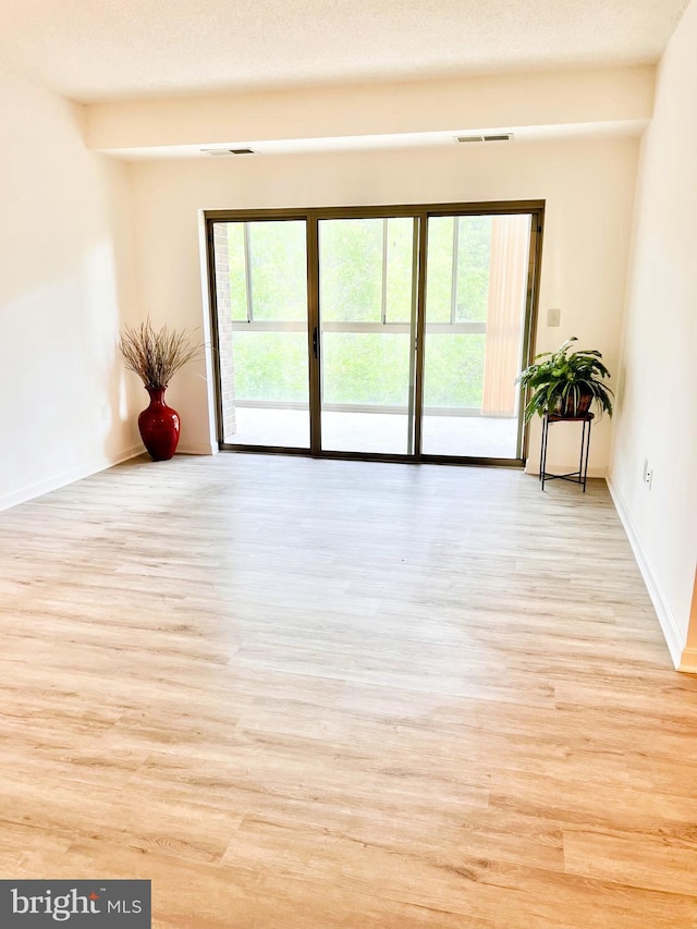 2900 N Leisure World Blvd Unit 515, Silver Spring, MD 20906 - spare room with wood finished floors and baseboards