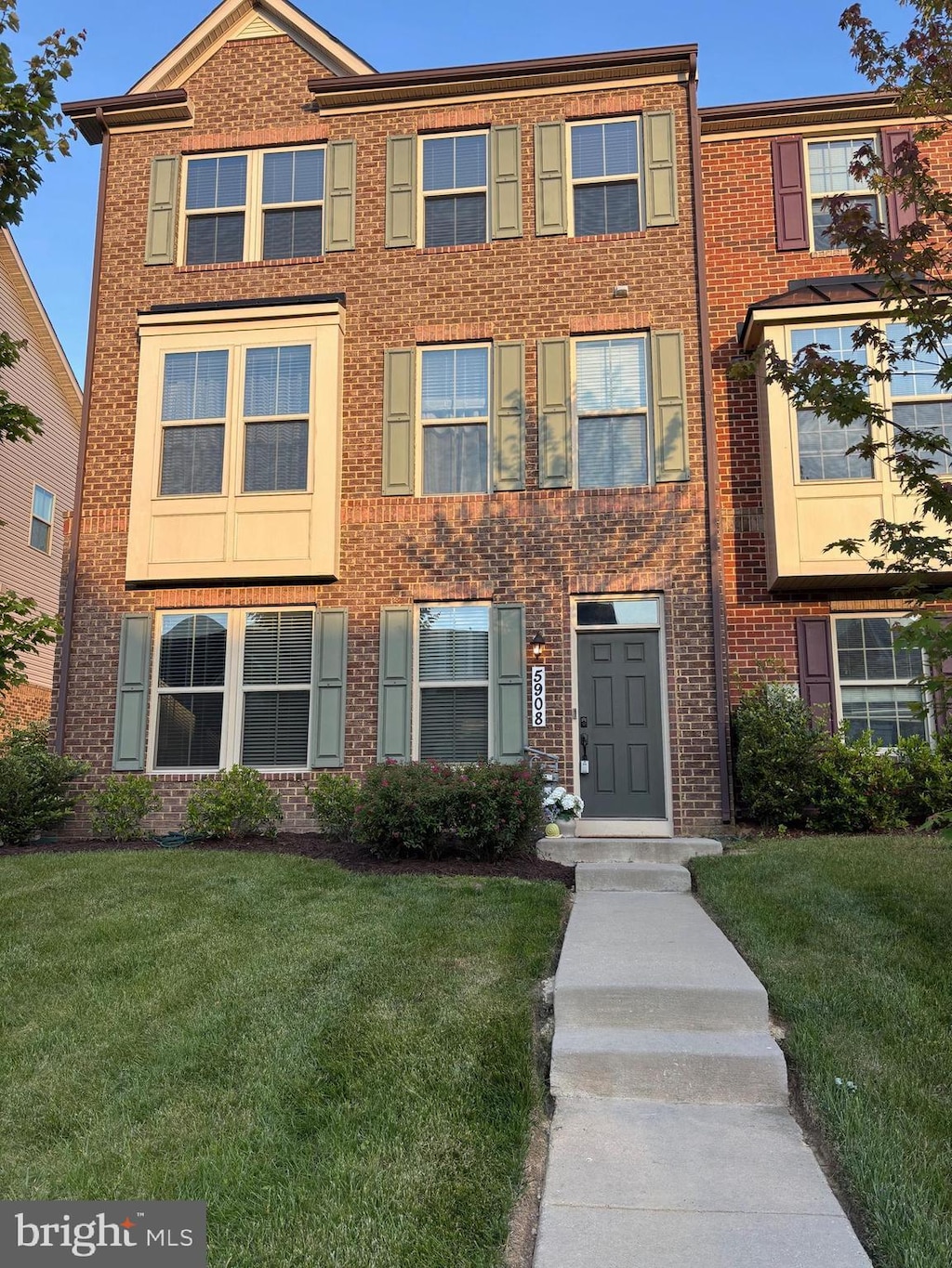 5908 Richmanor Ter, Upper Marlboro, MD 20772 - view of front of house with a front yard and brick siding