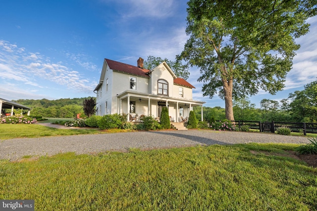 23350 Cedar Mountain Dr, Rapidan, VA 22733 - farmhouse featuring covered porch, a chimney, and gravel driveway
