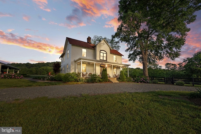 23350 Cedar Mountain Dr, Rapidan, VA 22733 - view of front facade with a chimney, covered porch, and gravel driveway