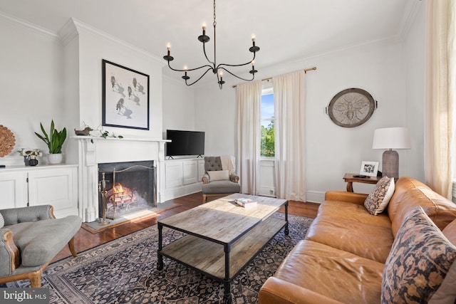 23350 Cedar Mountain Dr, Rapidan, VA 22733 - living room with crown molding, a chandelier, wood finished floors, a warm lit fireplace, and baseboards