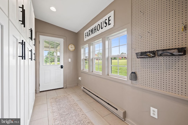 23350 Cedar Mountain Dr, Rapidan, VA 22733 - doorway to outside featuring a baseboard heating unit, healthy amount of natural light, lofted ceiling, baseboards, and light tile patterned flooring