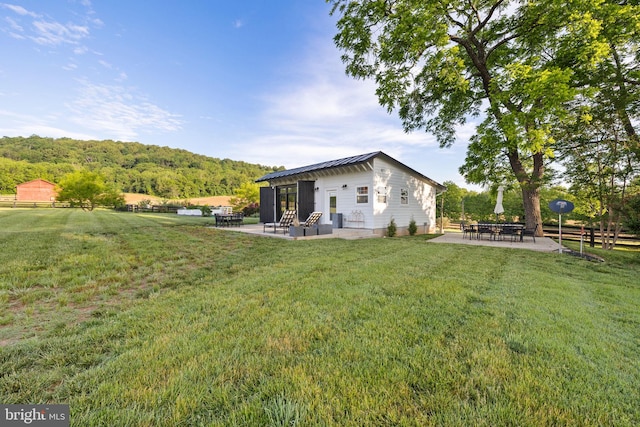 23350 Cedar Mountain Dr, Rapidan, VA 22733 - rear view of property featuring a patio and metal roof